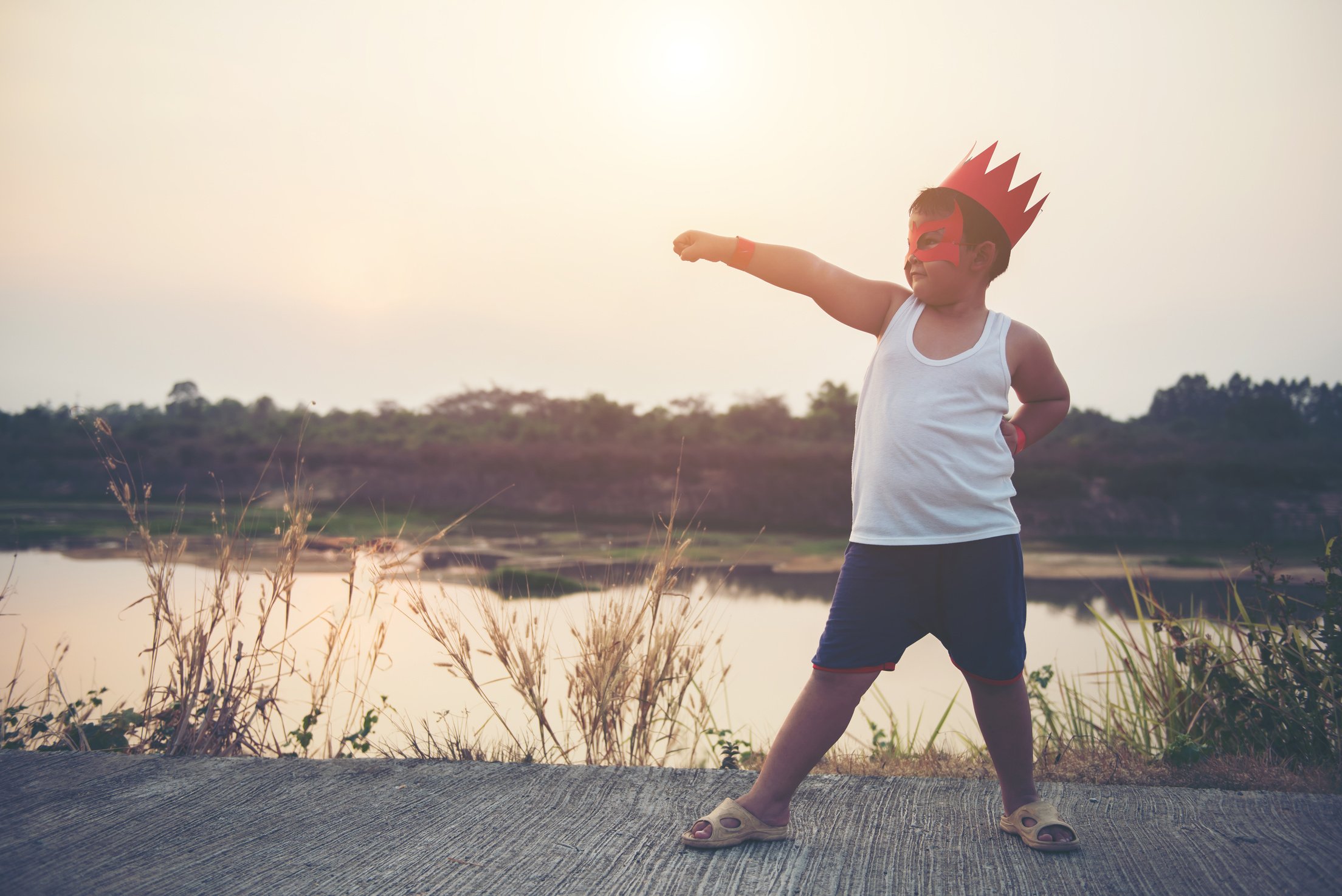 Super boy standing show power strong to fly